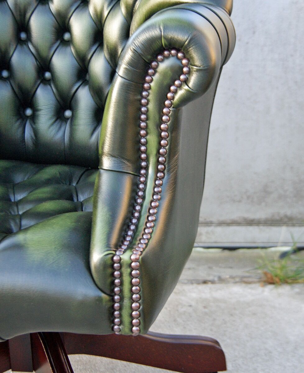 dark green leather armchairs