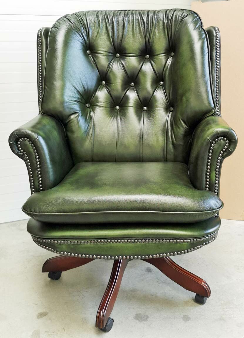 antique green armchair