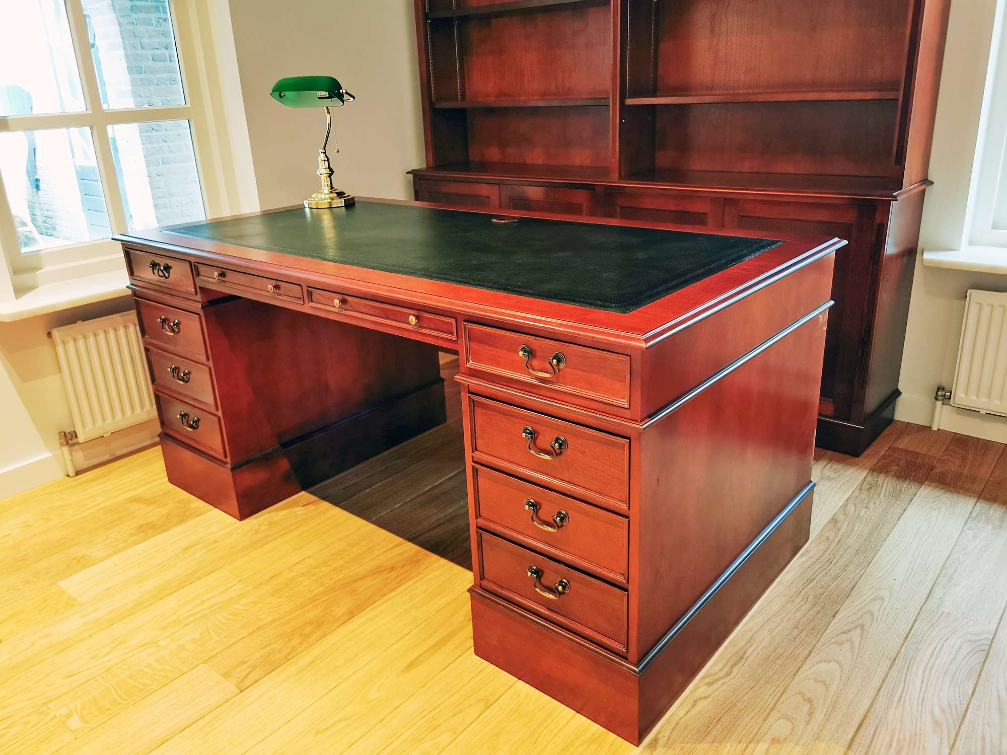 mahogany desk with half sized middle drawer giving more leg space